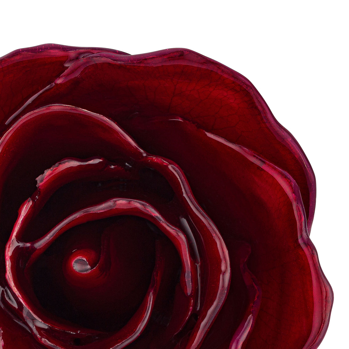 Natural (Green Stem) Forever Rose with Deep Red, Burgundy Colored Petals. View of Stem, Leaves, and Rose Petals. This a Forever Rose without any gold or other precious metals on it. zoomed in view from top.