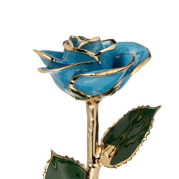 24K Gold Trimmed Forever Rose with Frozen Blue Petals with sparkles suspended in the finish. View of Stem, Leaves, and Rose Petals and Showing Detail of Gold Trim