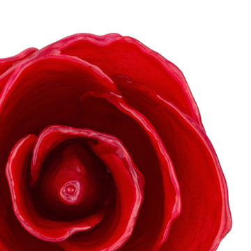 Natural (Green Stem) Forever Rose with Red Colored Petals. View of Stem, Leaves, and Rose Petals. This a Forever Rose without any gold or other precious metals on it. zoomed in view from top.