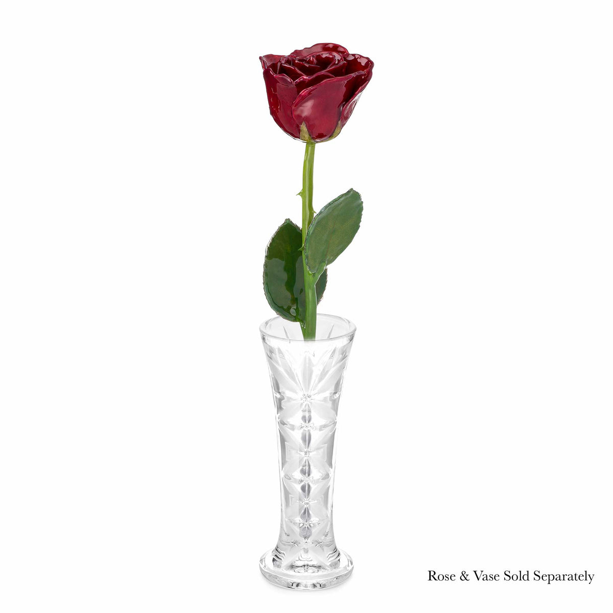 Natural (Green Stem) Forever Rose with Deep Red, Burgundy Colored Petals. View of Stem, Leaves, and Rose Petals. This a Forever Rose without any gold or other precious metals on it. shown with optional crystal vase